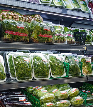 Image of fully loaded supermarket shelves