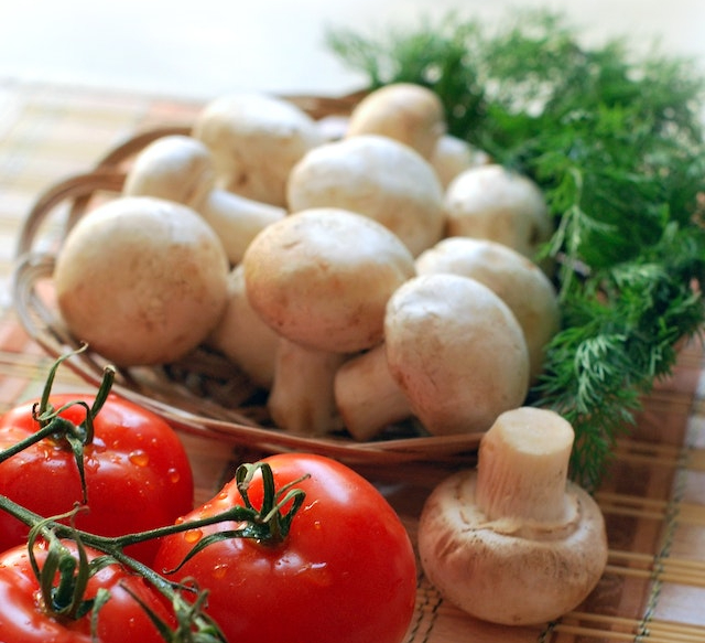 Bowl of mushrooms on the table. 