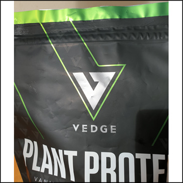 Close up of the Vedge Nutrition logo on the front of the pouch.